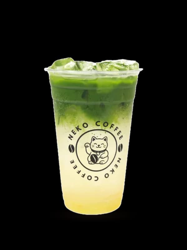 Matcha Yuzu Soda in a Neko Coffee cup